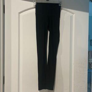 Lululemon Black leggings. Back pocket. Look like new. Size 2.